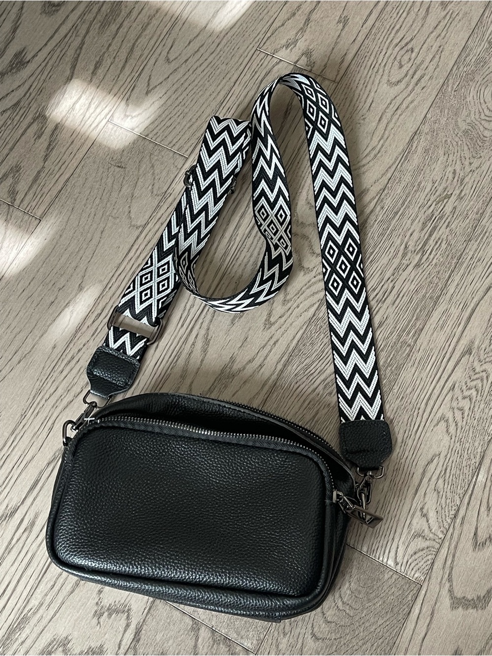 Black Leather Crossbody Bag with Patterned Strap